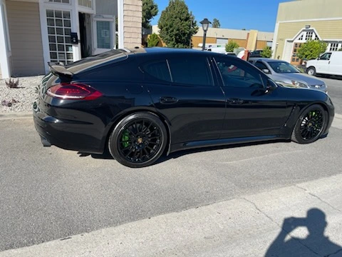 Black Porsche at ER Collision Auto Body Shop center