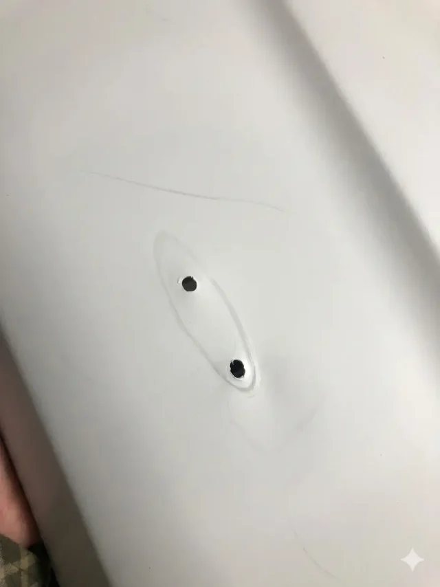 Drilled holes in car panels